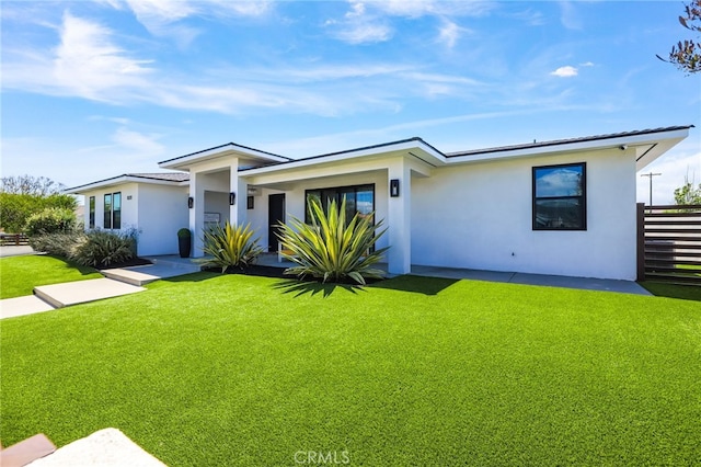 11221 Davenport Rd, Rossmoor, CA 90720 - view of front of home with stucco siding and a front lawn