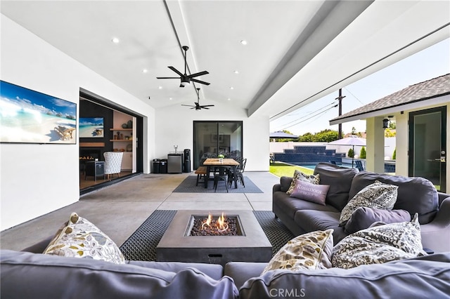 11221 Davenport Rd, Rossmoor, CA 90720 - living area with concrete flooring, a ceiling fan, and recessed lighting