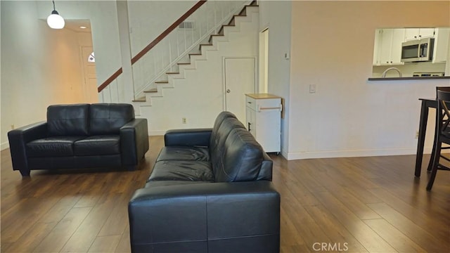 517 Wayland Ct, Claremont, CA 91711 - living area with dark wood-type flooring and stairway