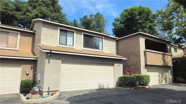 517 Wayland Ct, Claremont, CA 91711 - view of property with stucco siding and a garage