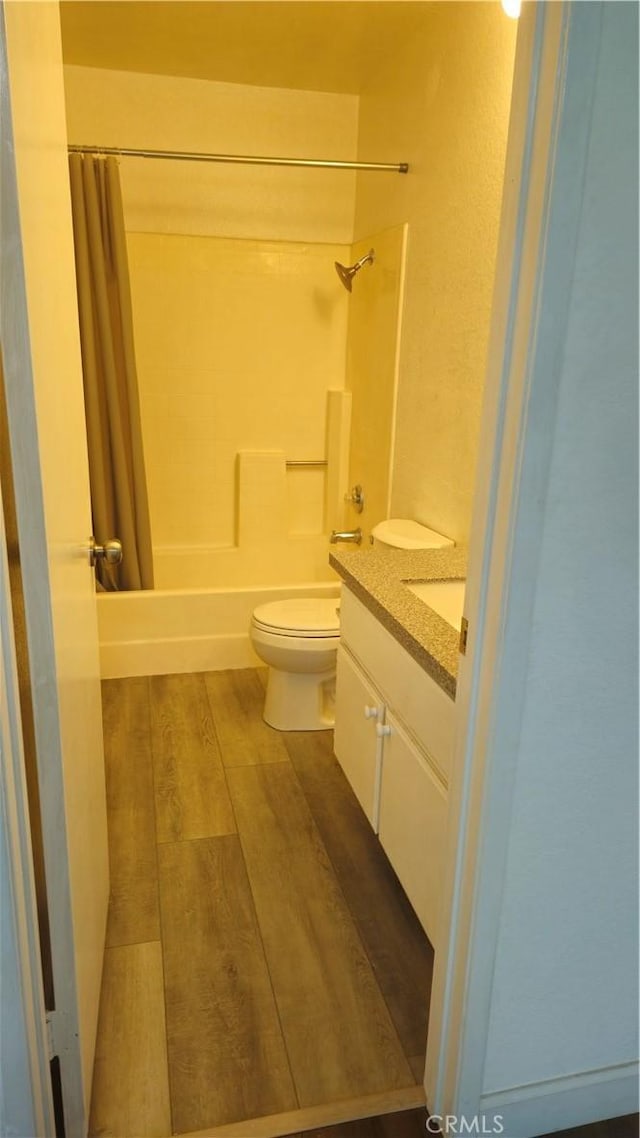 517 Wayland Ct, Claremont, CA 91711 - bathroom with shower / bath combo, wood finished floors, toilet, and vanity