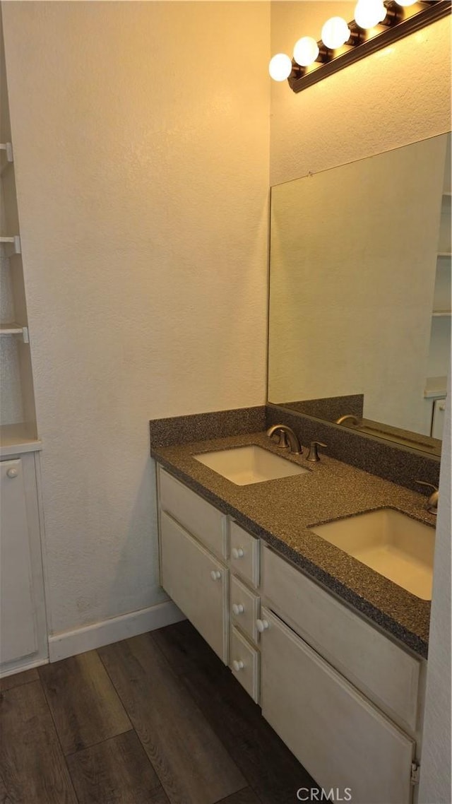 517 Wayland Ct, Claremont, CA 91711 - full bathroom with wood finished floors and double vanity