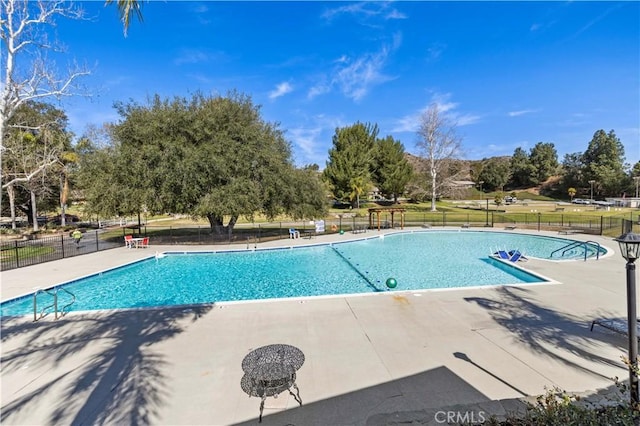 19439 Oak Crossing Rd, Newhall, CA 91321 - community pool with a patio area and view of wooded area