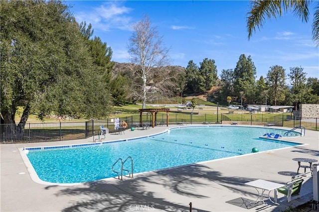19439 Oak Crossing Rd, Newhall, CA 91321 - community pool with a patio area and view of wooded area
