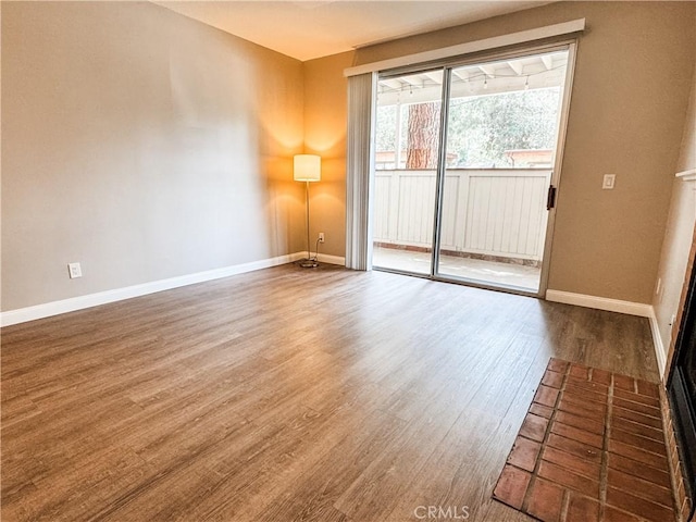2474 Pleasant Way Unit E, Thousand Oaks, CA 91362 - empty room featuring wood finished floors and baseboards