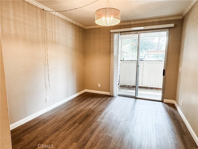 2474 Pleasant Way Unit E, Thousand Oaks, CA 91362 - unfurnished room with dark wood finished floors, ornamental molding, and a chandelier