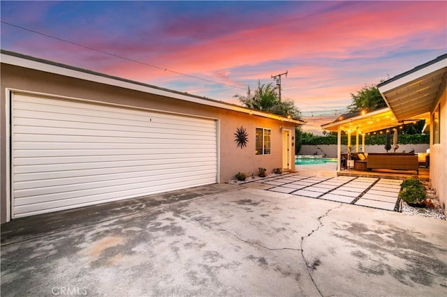 835 S Terri Ann Dr, West Covina, CA 91791 - garage at dusk featuring driveway