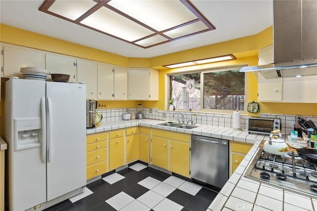 297 Connors Ave, Chico, CA 95926 - kitchen with stainless steel appliances, a sink, island range hood, and tile counters