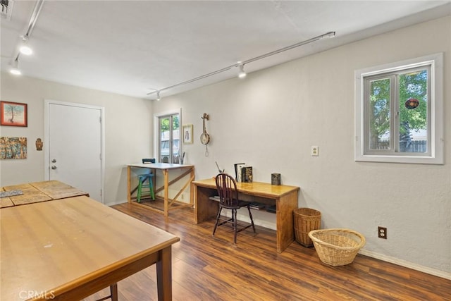 297 Connors Ave, Chico, CA 95926 - home office featuring rail lighting, wood finished floors, and baseboards