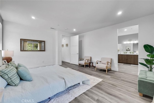 689 Castlehill Dr, Walnut, CA 91789 - bedroom featuring recessed lighting, light wood-style floors, baseboards, and ensuite bathroom