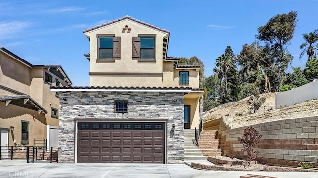 689 Castlehill Dr, Walnut, CA 91789 - view of front of property featuring driveway, fence, stone siding, and a garage