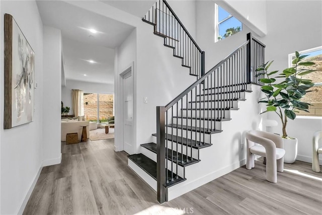 689 Castlehill Dr, Walnut, CA 91789 - staircase featuring wood finished floors, baseboards, and recessed lighting