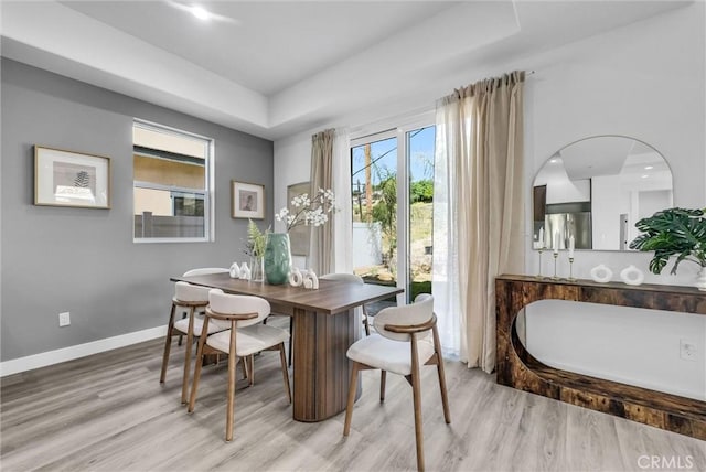 689 Castlehill Dr, Walnut, CA 91789 - dining area with healthy amount of natural light, light wood-type flooring, and baseboards