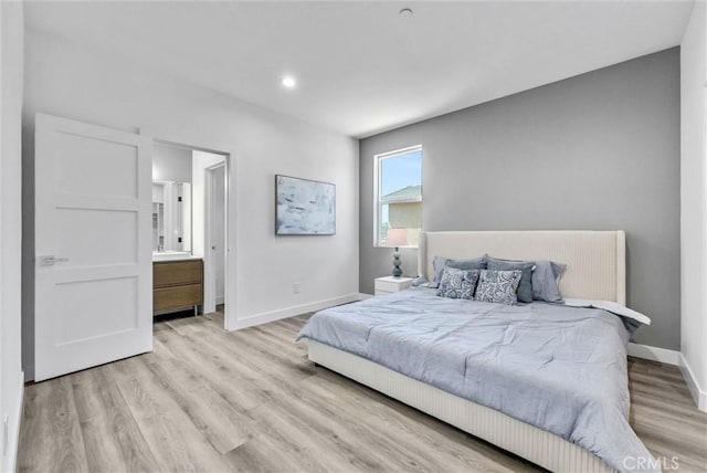 689 Castlehill Dr, Walnut, CA 91789 - bedroom featuring baseboards, wood finished floors, recessed lighting, and ensuite bath