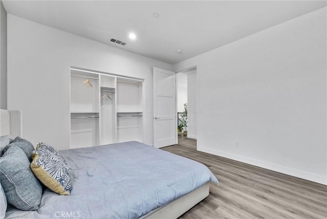 689 Castlehill Dr, Walnut, CA 91789 - bedroom with baseboards, wood finished floors, a closet, and recessed lighting