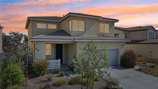 36927 Arezzo Ct, Beaumont, CA 92223 - traditional home with stucco siding, driveway, a garage, and a tiled roof