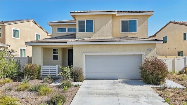36927 Arezzo Ct, Beaumont, CA 92223 - traditional home featuring fence, an attached garage, concrete driveway, and stucco siding