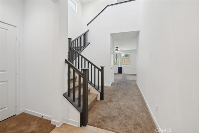 36927 Arezzo Ct, Beaumont, CA 92223 - stairs featuring carpet floors, a ceiling fan, and baseboards