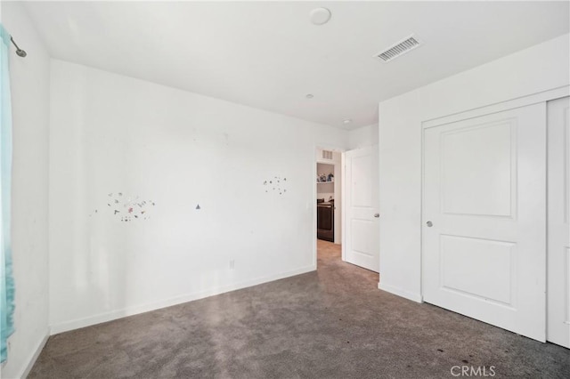36927 Arezzo Ct, Beaumont, CA 92223 - unfurnished bedroom featuring carpet flooring, baseboards, and a closet