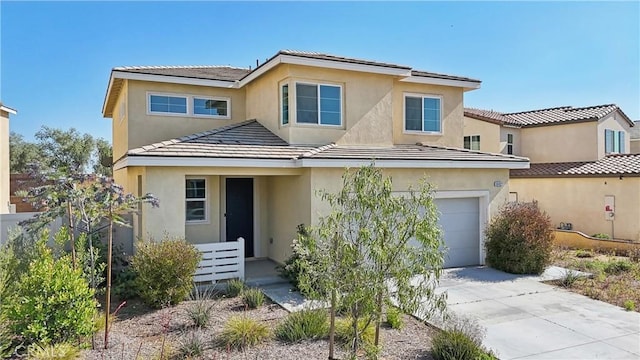 36927 Arezzo Ct, Beaumont, CA 92223 - traditional-style house with stucco siding, a garage, driveway, and a tile roof