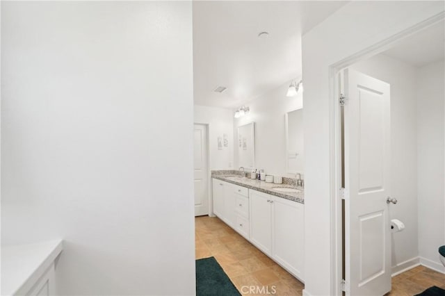 36927 Arezzo Ct, Beaumont, CA 92223 - full bath with double vanity and baseboards