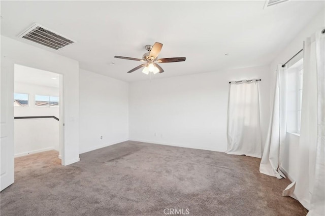 36927 Arezzo Ct, Beaumont, CA 92223 - unfurnished bedroom with carpet flooring, a ceiling fan, and baseboards
