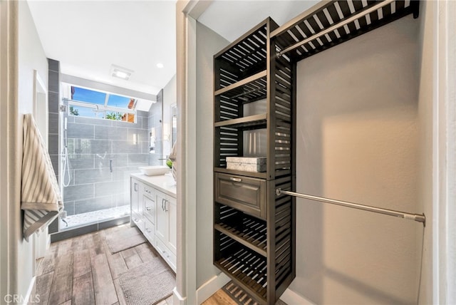 417 Via Presa, San Clemente, CA 92672 - walk in closet featuring wood finished floors and lofted ceiling