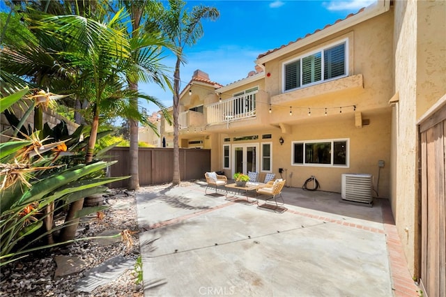 417 Via Presa, San Clemente, CA 92672 - rear view of house featuring a balcony, fence, stucco siding, a patio area, and central AC unit