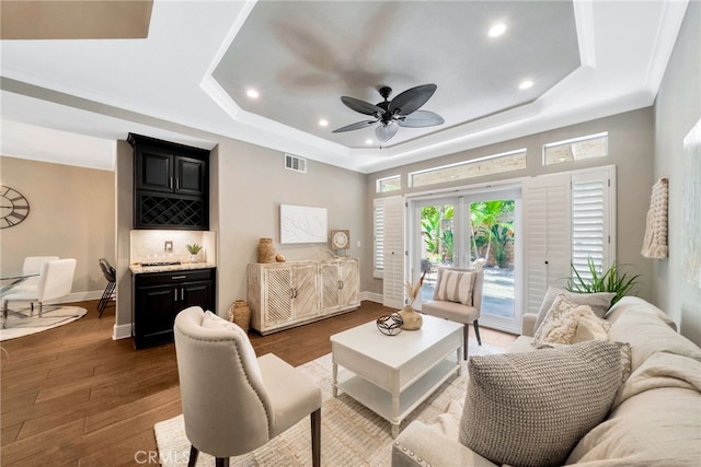 417 Via Presa, San Clemente, CA 92672 - living area with a tray ceiling, recessed lighting, baseboards, wood finished floors, and ceiling fan