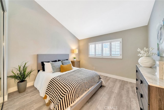 417 Via Presa, San Clemente, CA 92672 - bedroom featuring light wood-style floors, lofted ceiling, and baseboards