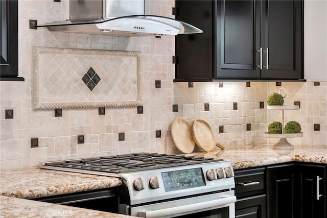 417 Via Presa, San Clemente, CA 92672 - kitchen featuring gas stove, extractor fan, backsplash, and dark cabinetry