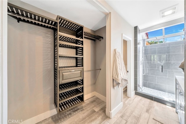 417 Via Presa, San Clemente, CA 92672 - walk in closet featuring wood finished floors