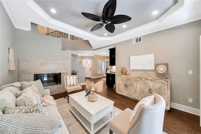 417 Via Presa, San Clemente, CA 92672 - living room with a tray ceiling, wood finished floors, ceiling fan, baseboards, and recessed lighting