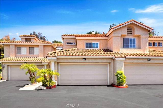 417 Via Presa, San Clemente, CA 92672 - mediterranean / spanish-style home with stucco siding, a garage, and a tiled roof