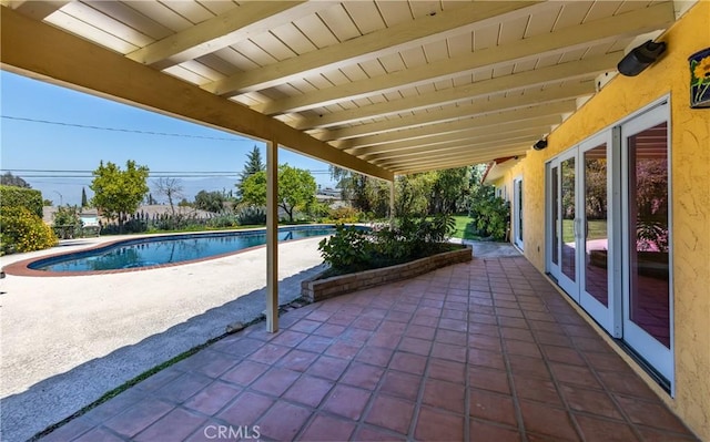 645 Alta Loma Dr, Redlands, CA 92373 - swimming pool featuring a patio area and french doors