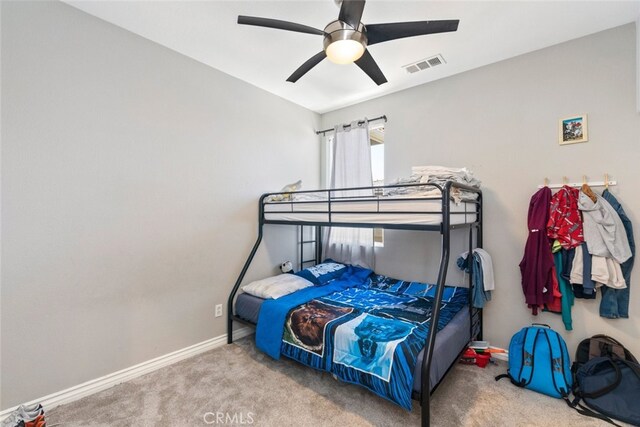 27435 Larabee Ct Unit 2, Murrieta, CA 92562 - carpeted bedroom featuring a ceiling fan and baseboards