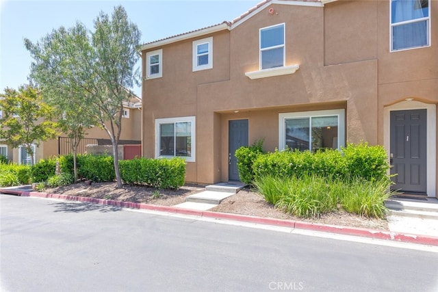 27435 Larabee Ct Unit 2, Murrieta, CA 92562 - view of property with stucco siding