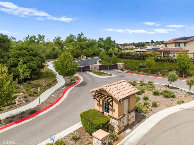 2569 Pasture Gln, Escondido, CA 92029 - view of home's community featuring a gate, a residential view, and fence