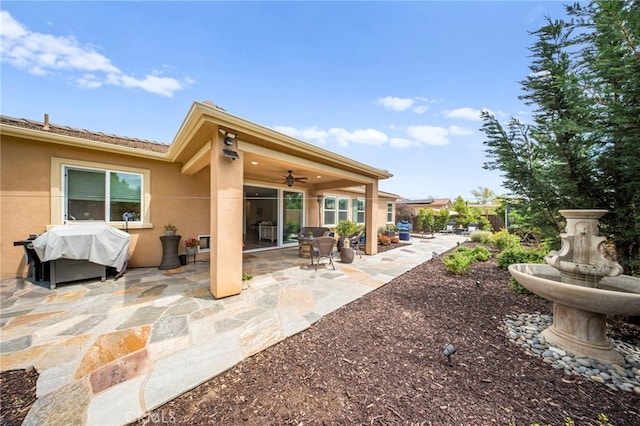 2569 Pasture Gln, Escondido, CA 92029 - rear view of house featuring stucco siding, a patio area, and a ceiling fan