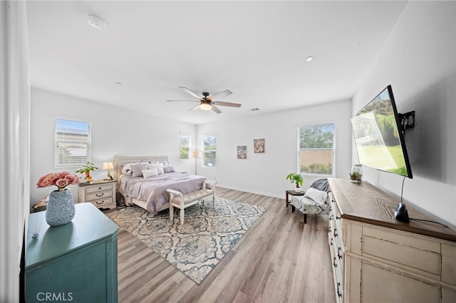 2569 Pasture Gln, Escondido, CA 92029 - bedroom with light wood finished floors, baseboards, and ceiling fan