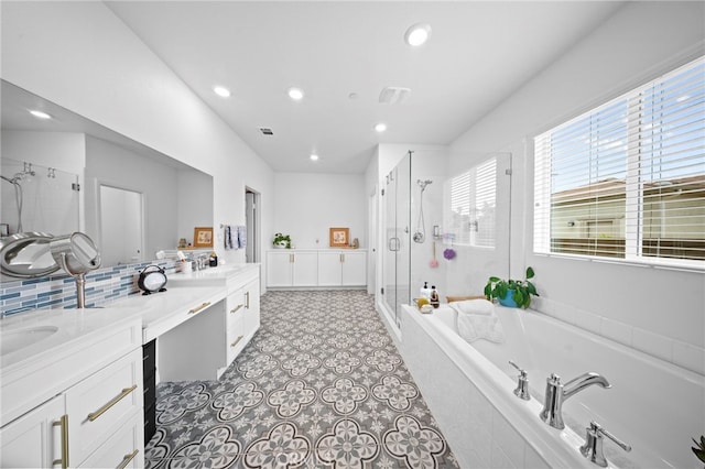 2569 Pasture Gln, Escondido, CA 92029 - full bath with a garden tub, a shower stall, recessed lighting, double vanity, and decorative backsplash