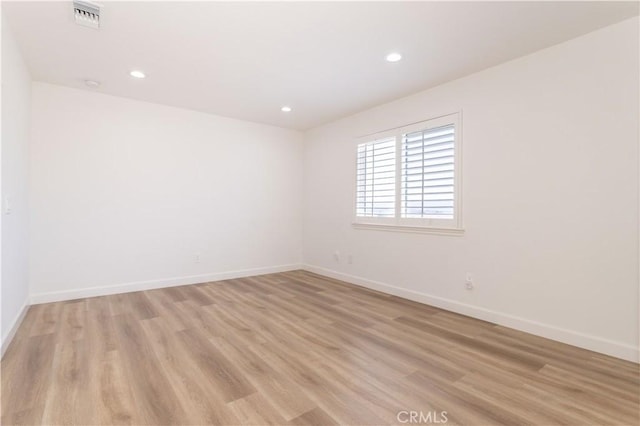 17195 Summit Hills Dr, Canyon Country, CA 91387 - spare room with light wood-type flooring, baseboards, and recessed lighting