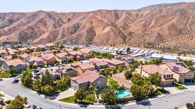 17195 Summit Hills Dr, Canyon Country, CA 91387 - aerial perspective of suburban area featuring a mountain backdrop