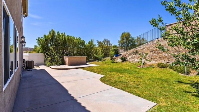 17195 Summit Hills Dr, Canyon Country, CA 91387 - view of yard with a patio and central air condition unit
