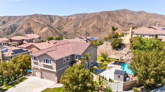 17195 Summit Hills Dr, Canyon Country, CA 91387 - aerial perspective of suburban area featuring a pool and a mountain backdrop