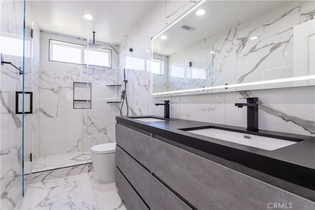 17195 Summit Hills Dr, Canyon Country, CA 91387 - full bathroom with double vanity, a marble finish shower, toilet, and marble tiled flooring