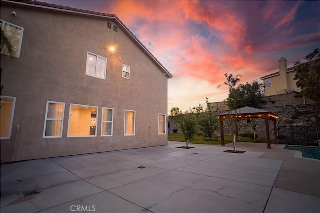 17195 Summit Hills Dr, Canyon Country, CA 91387 - rear view of property featuring a gazebo, a patio, and stucco siding