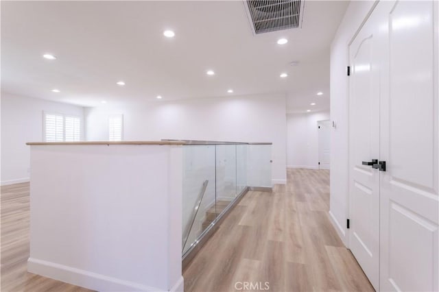 17195 Summit Hills Dr, Canyon Country, CA 91387 - corridor featuring light wood finished floors, baseboards, and recessed lighting