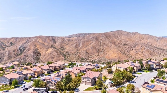 17195 Summit Hills Dr, Canyon Country, CA 91387 - aerial view of residential area featuring a mountain backdrop