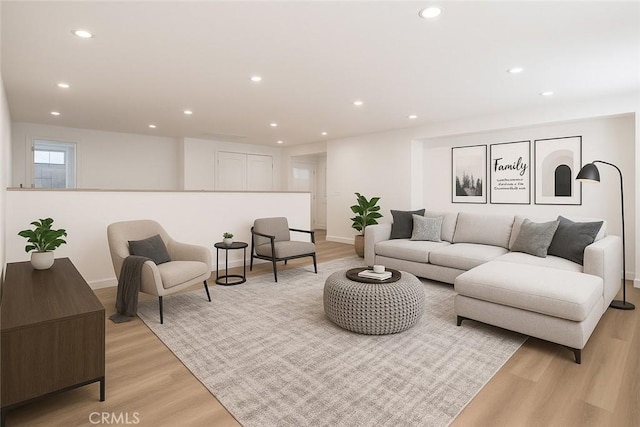 17195 Summit Hills Dr, Canyon Country, CA 91387 - living room with light wood-style flooring, recessed lighting, and baseboards